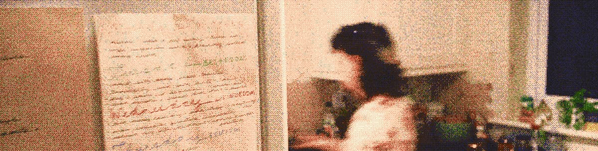 My partner in the kitchen at home.