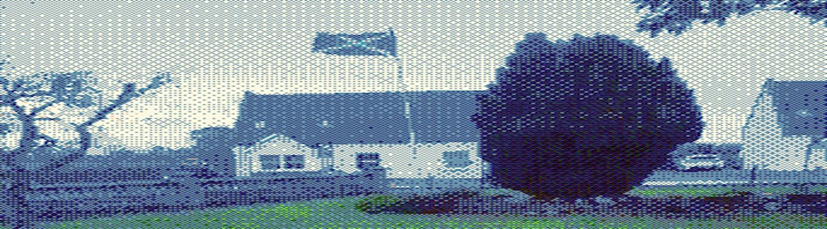 a house with a Scotland flag hanging from a flagpole.